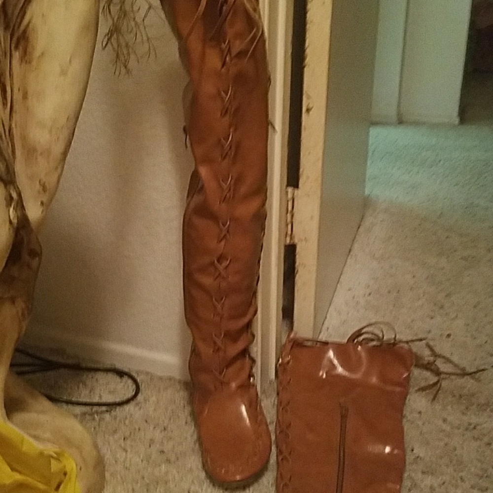 Thigh high boots.